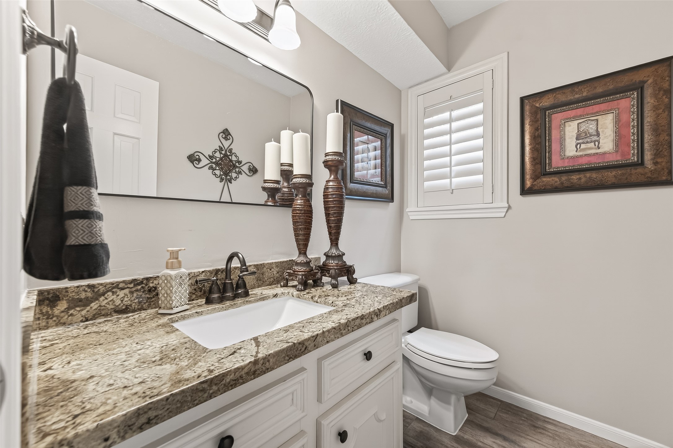7310 Maidstone Lane Houston, TX 77095 - Photo 14 of 40 Attractive powder room with granite counters, bronze fixtures and custom mirror.
