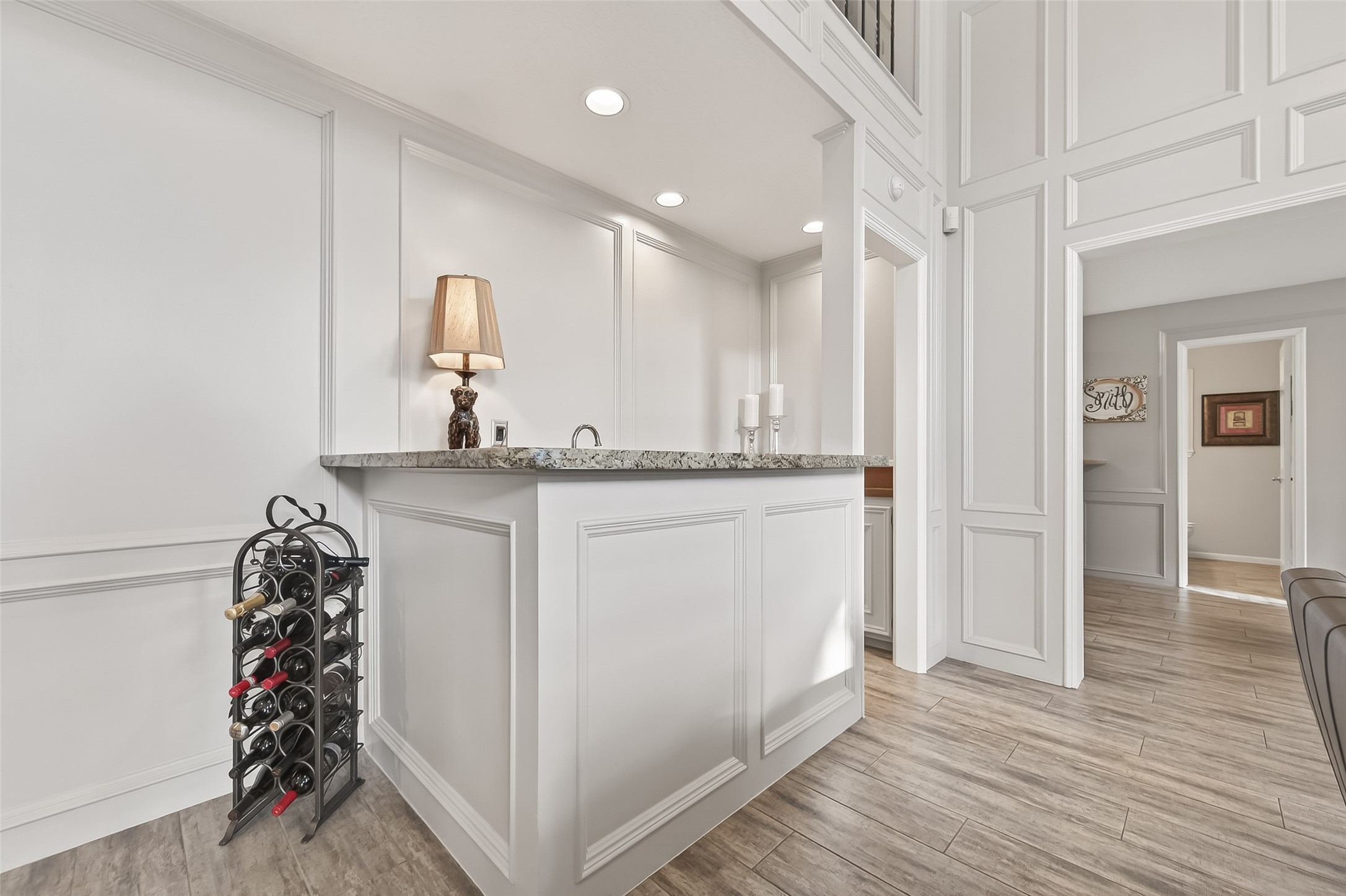 7310 Maidstone Lane Houston, TX 77095 - Photo 15 of 40 There is a wet bar at the rear of the family room with granite counters and a faucet/sink.