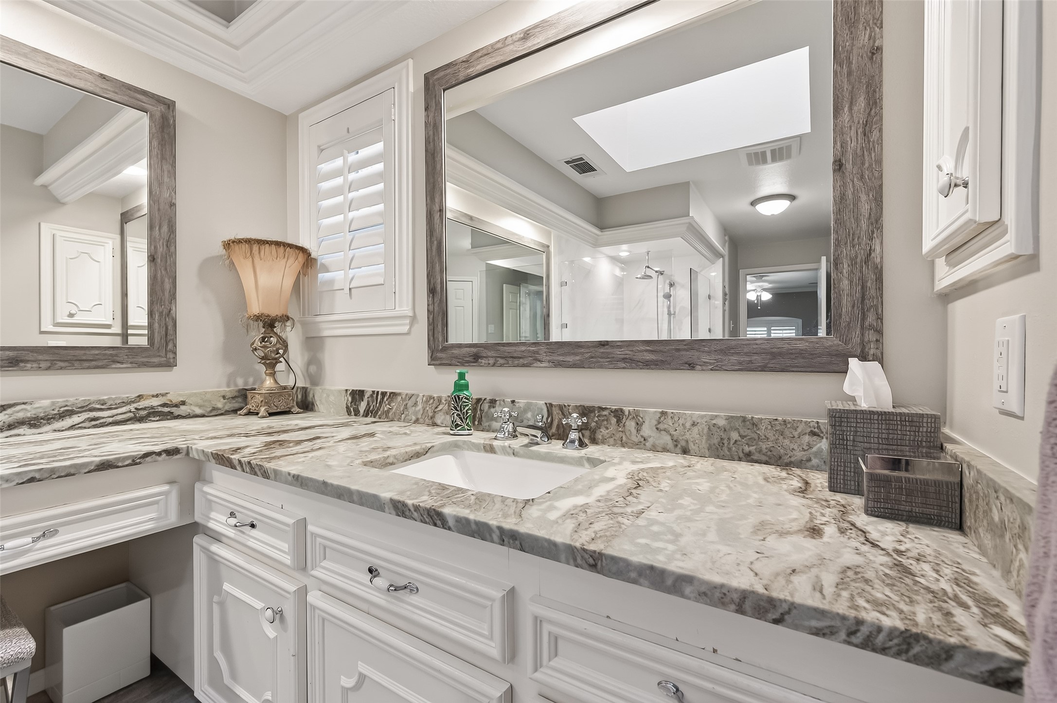 7310 Maidstone Lane Houston, TX 77095 - Photo 21 of 40 Updated and alluring leathered countertops with natural veins are quite impressive.