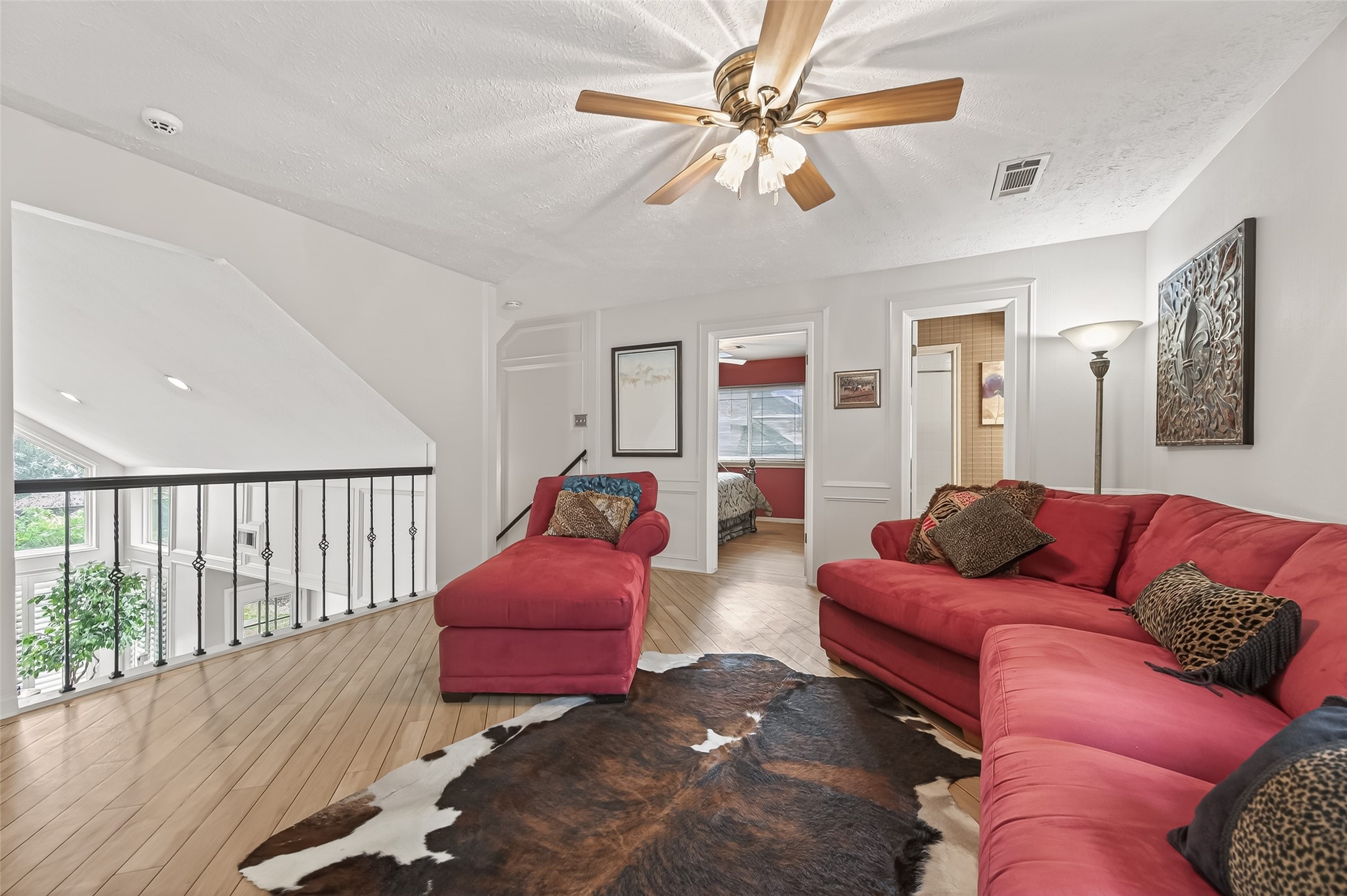 7310 Maidstone Lane Houston, TX 77095 - Photo 23 of 40 Multi-functional gameroom or media room (16X14) upstairs with wood-look laminate flooring.