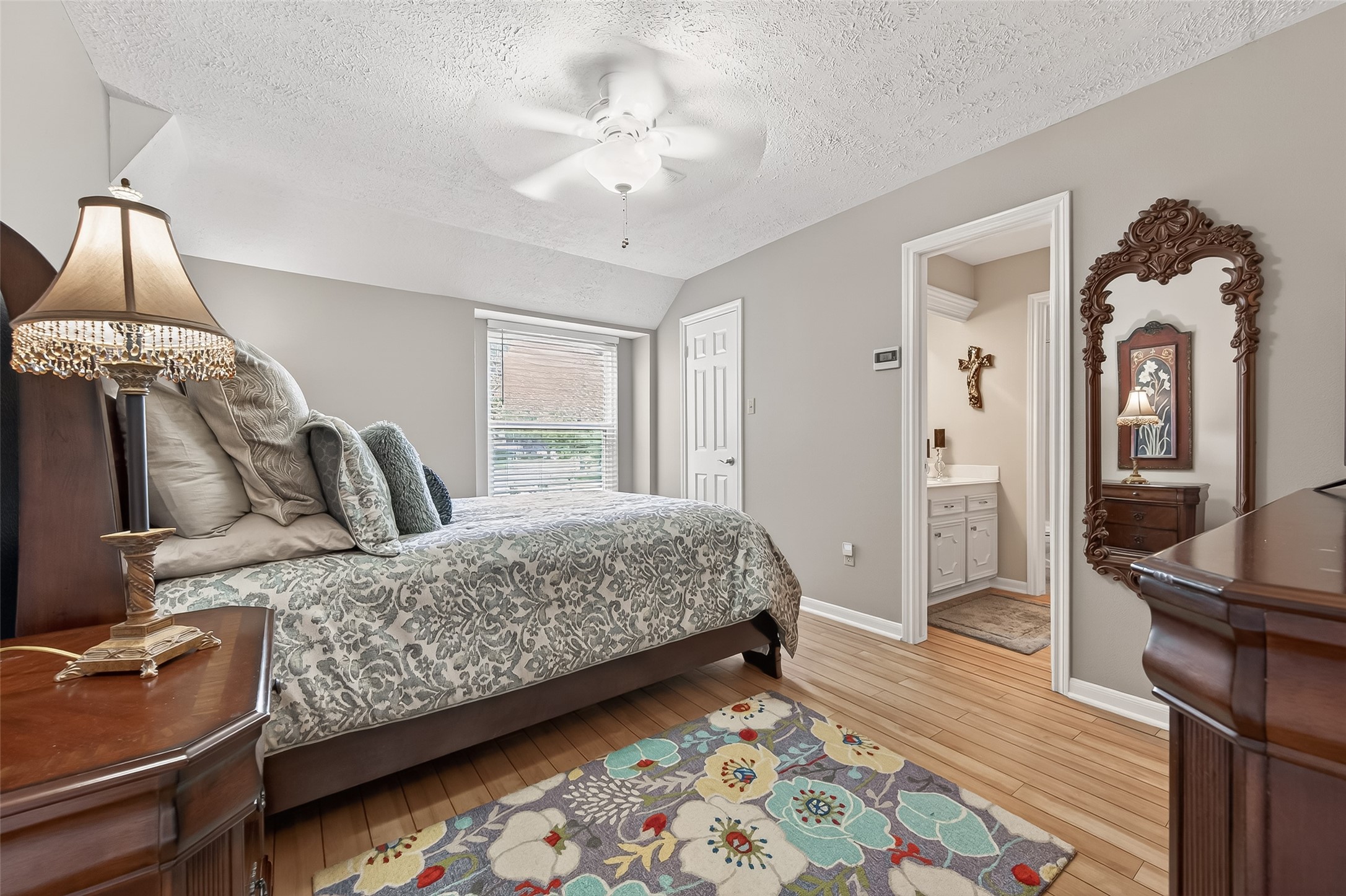 7310 Maidstone Lane Houston, TX 77095 - Photo 25 of 40 One of the guest bedrooms (14X10) that also has laminate flooring.
