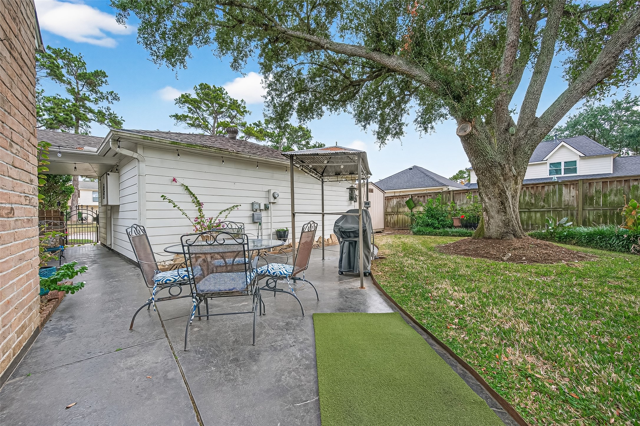 7310 Maidstone Lane Houston, TX 77095 - Photo 34 of 40 If you notice to the right of the garage in this photo, there is a recent 10X8 storage building. It sits on a driveway that was extended into the backyard and could also be used for a boat storage.
