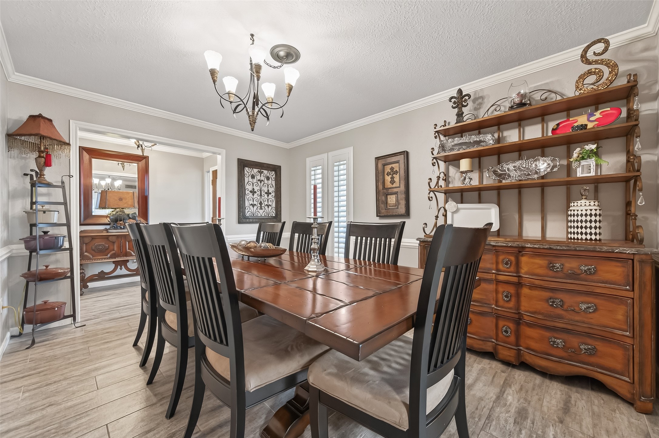 7310 Maidstone Lane Houston, TX 77095 - Photo 7 of 40 Elegant formal dining room (14X10) with crown moldings and chair rails set this room off. Perfect for hosting family or holidays.
