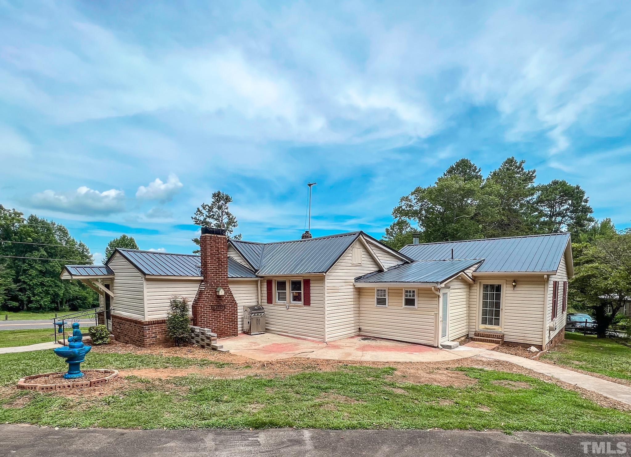 1556 Gentry-Dunkley Road Roxboro, NC 27574 - Photo 47 of 47 front view of house with a yard