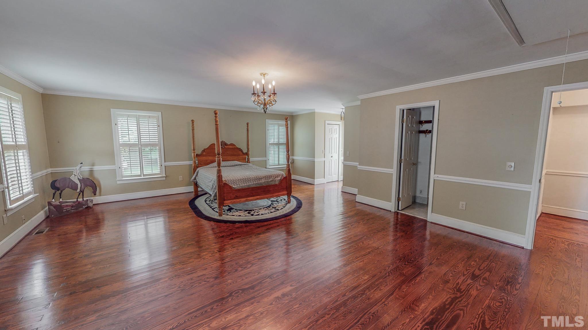 1556 Gentry-Dunkley Road Roxboro, NC 27574 - Photo 5 of 47 a living room with furniture and wooden floor
