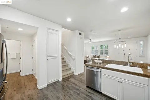 a kitchen with counter top space and appliances