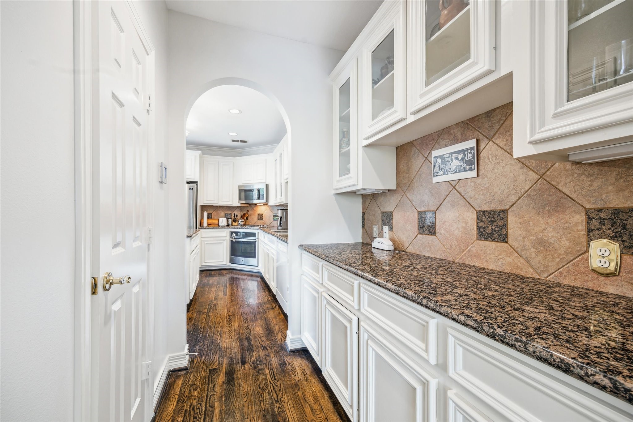 1202 Marconi Street Houston, TX 77019 - Photo 6 of 23 a kitchen with granite countertop lots of counter top space