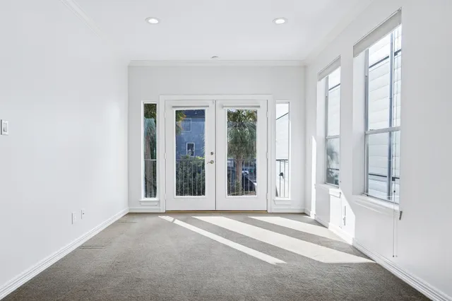 a view of a bathroom with a tub and shower