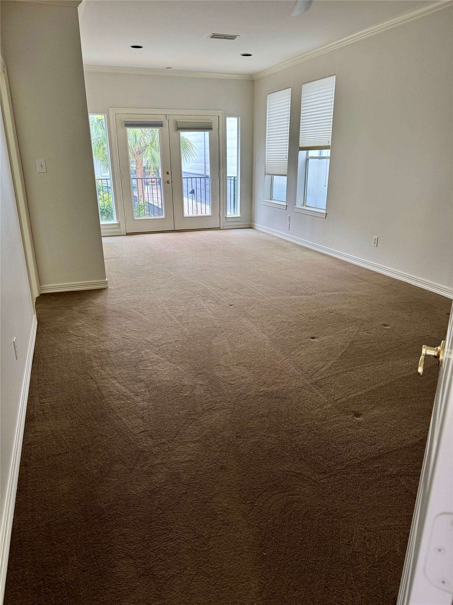 1202 Marconi Street Houston, TX 77019 - Photo 10 of 23 an empty room with windows