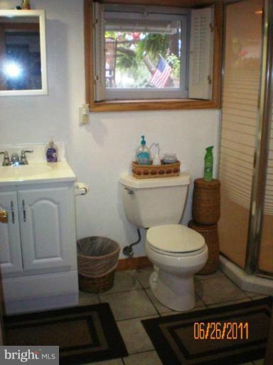 5105 Shelbourne Road Halethorpe, MD 21227 - Photo 6 of 30 a bathroom with a toilet and a sink