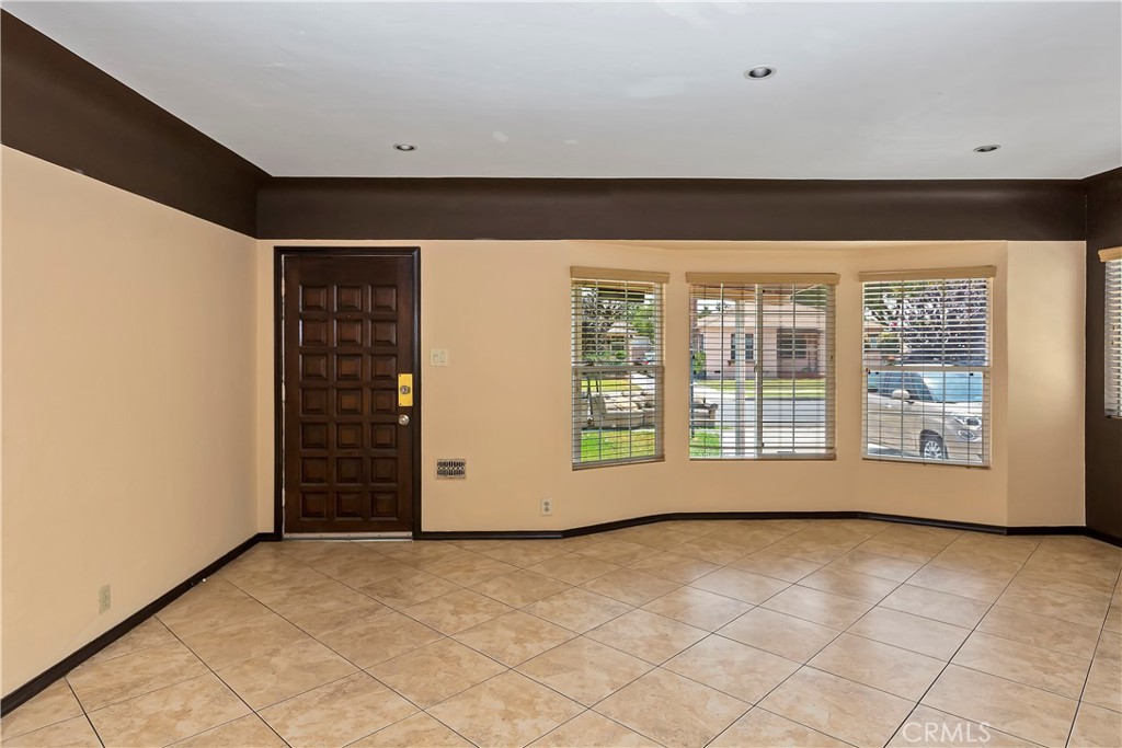 617 South Chester Avenue Compton, CA 90221 - Photo 13 of 34 a view of an empty room with a window