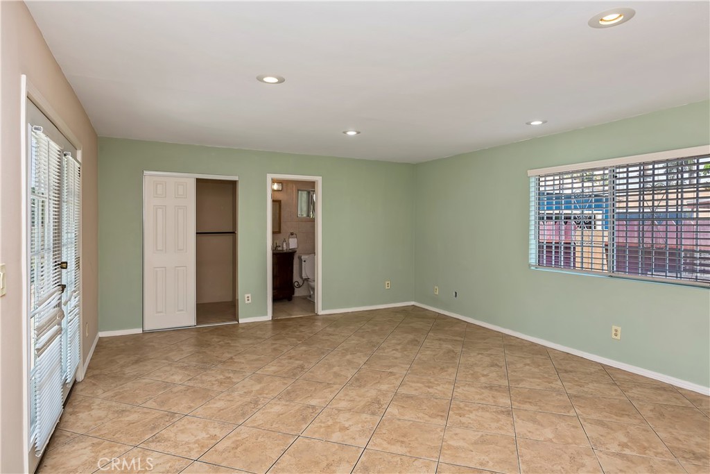 617 South Chester Avenue Compton, CA 90221 - Photo 21 of 34 a view of an empty room with a window