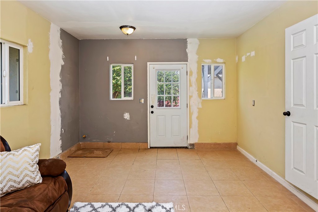 617 South Chester Avenue Compton, CA 90221 - Photo 28 of 34 a view of a bedroom with furniture and windows