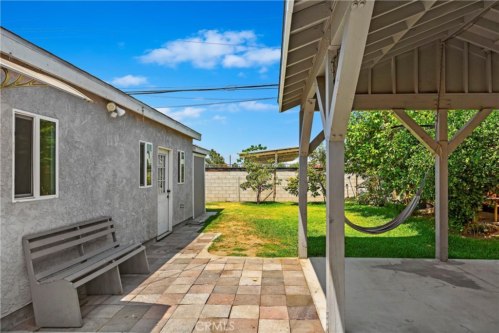 617 South Chester Avenue Compton, CA 90221 - Photo 30 of 34 a view of a backyard with large trees and plants
