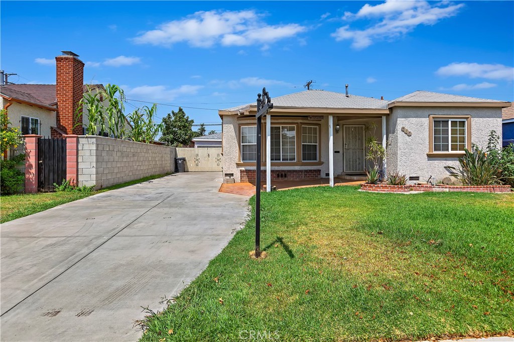 617 South Chester Avenue Compton, CA 90221 - Photo 3 of 34 a view of a house with backyard and porch