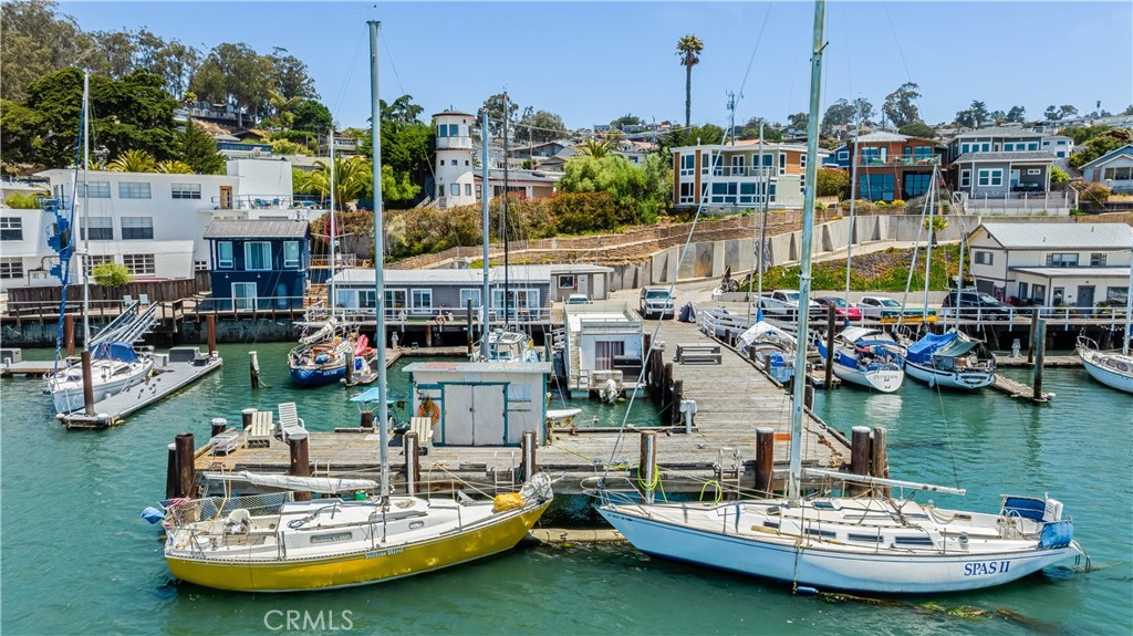 201 Main Street Morro Bay, CA 93442 - Photo 2 of 5 a view of a lake with boats and palm trees