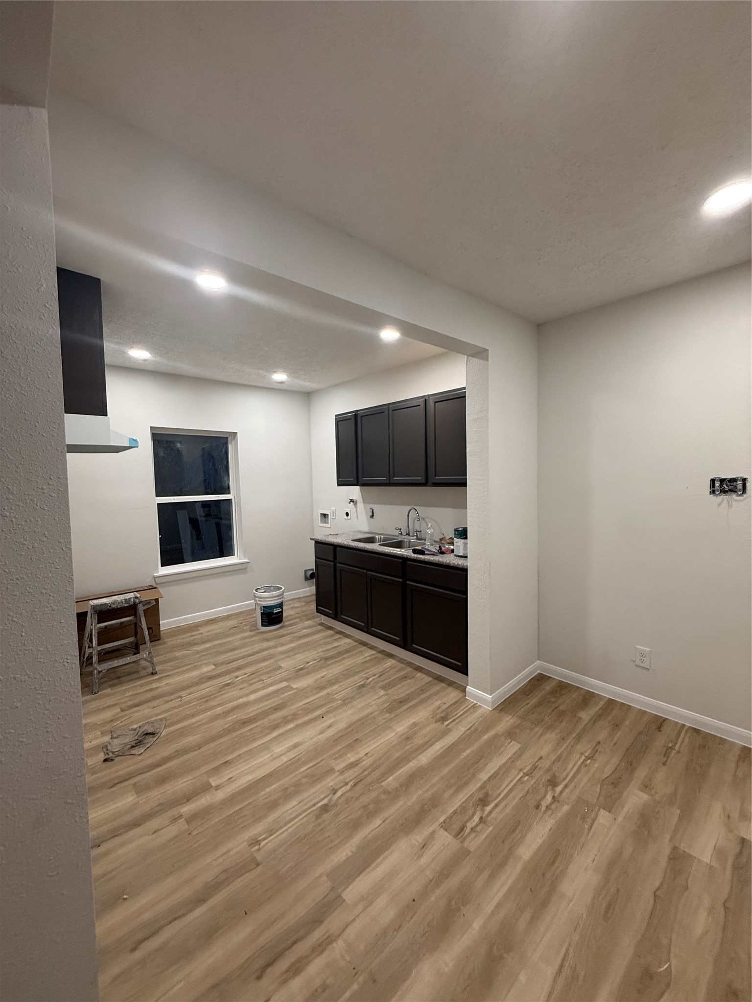 7023 Canal Street Houston, TX 77011 - Photo 6 of 9 a view of a kitchen with microwave and stove