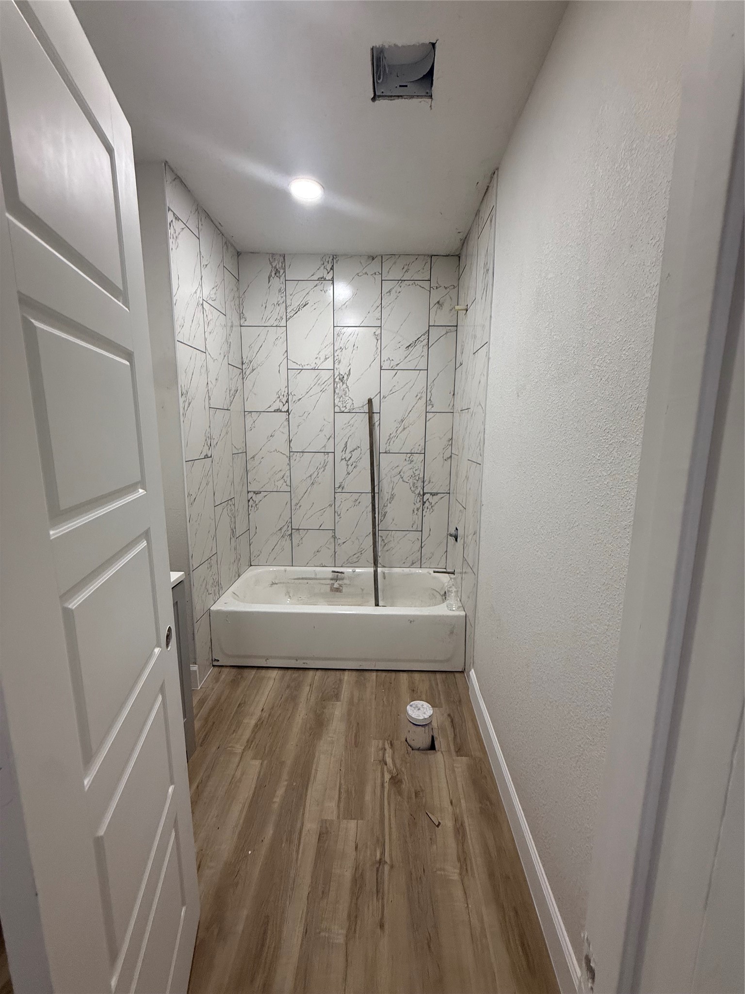 7023 Canal Street Houston, TX 77011 - Photo 8 of 9 a bathroom with a sink and a shower