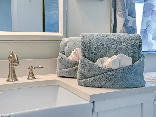 a living room with a couch and a window