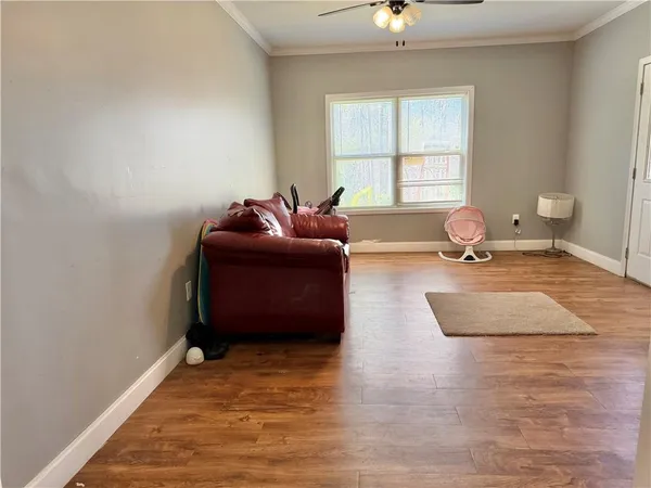 a balcony with wooden floor