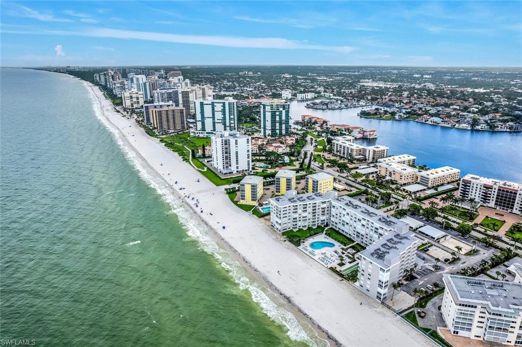 3443 Gulf Shore Boulevard North, Unit 710 Naples, FL 34103 - Photo 28 of 29 a view of a city from a terrace