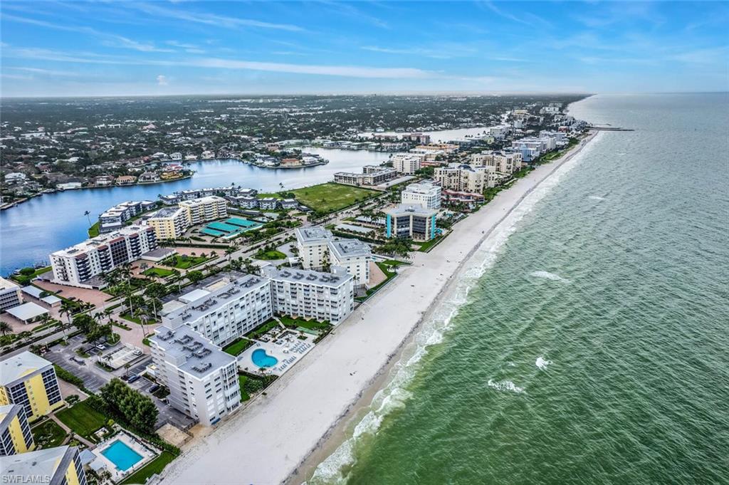 3443 Gulf Shore Boulevard North, Unit 710 Naples, FL 34103 - Photo 29 of 29 an aerial view of a city
