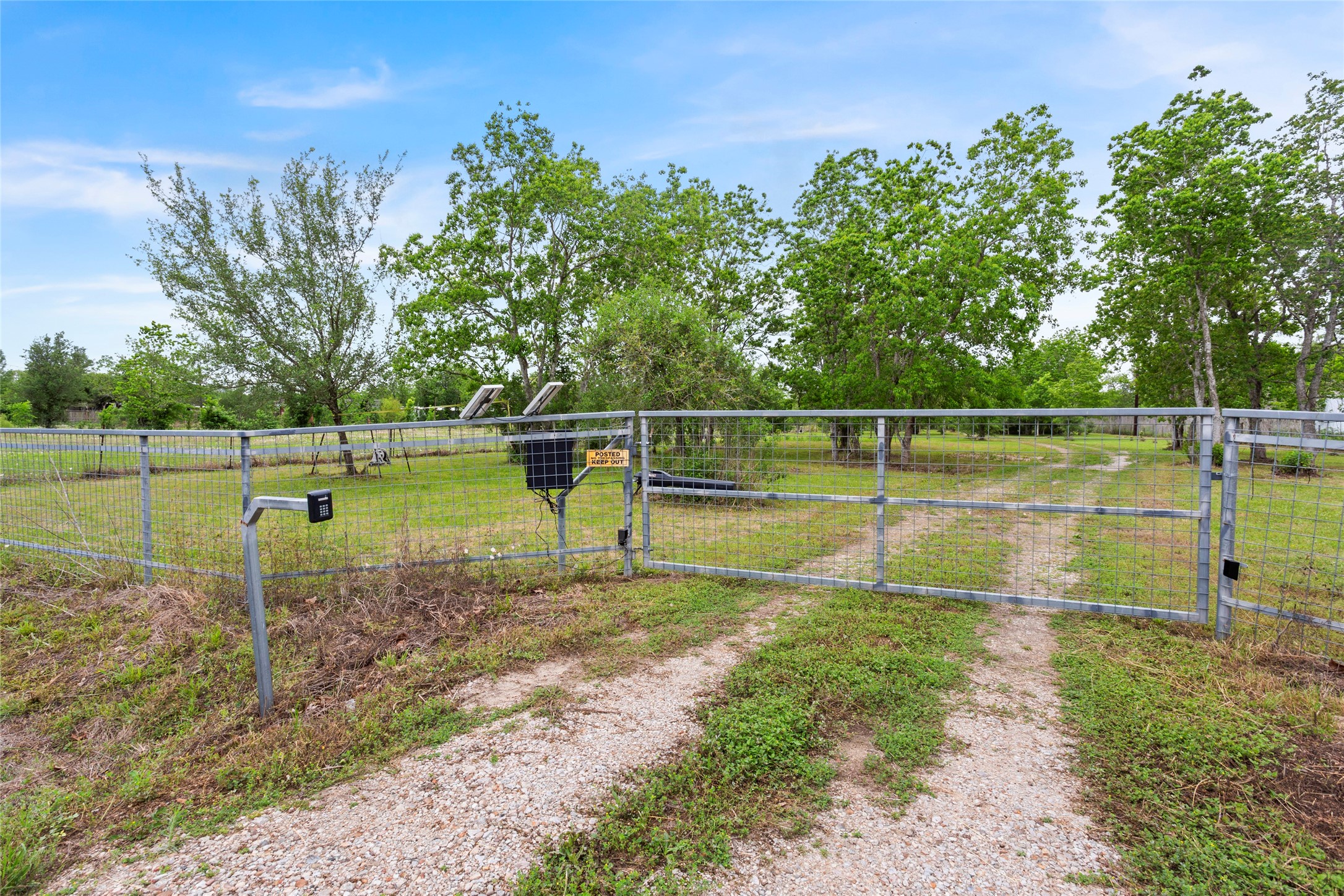 3650 Rivers Road Pearland, TX 77578 - Photo 4 of 22 Solar powered entry gate with keypad.