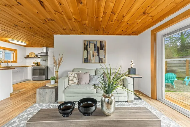 a living room with furniture and a table