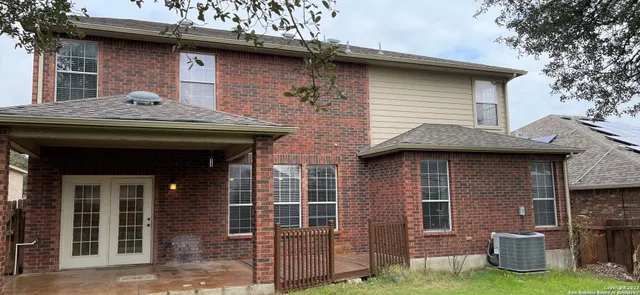 a view of house with outdoor space