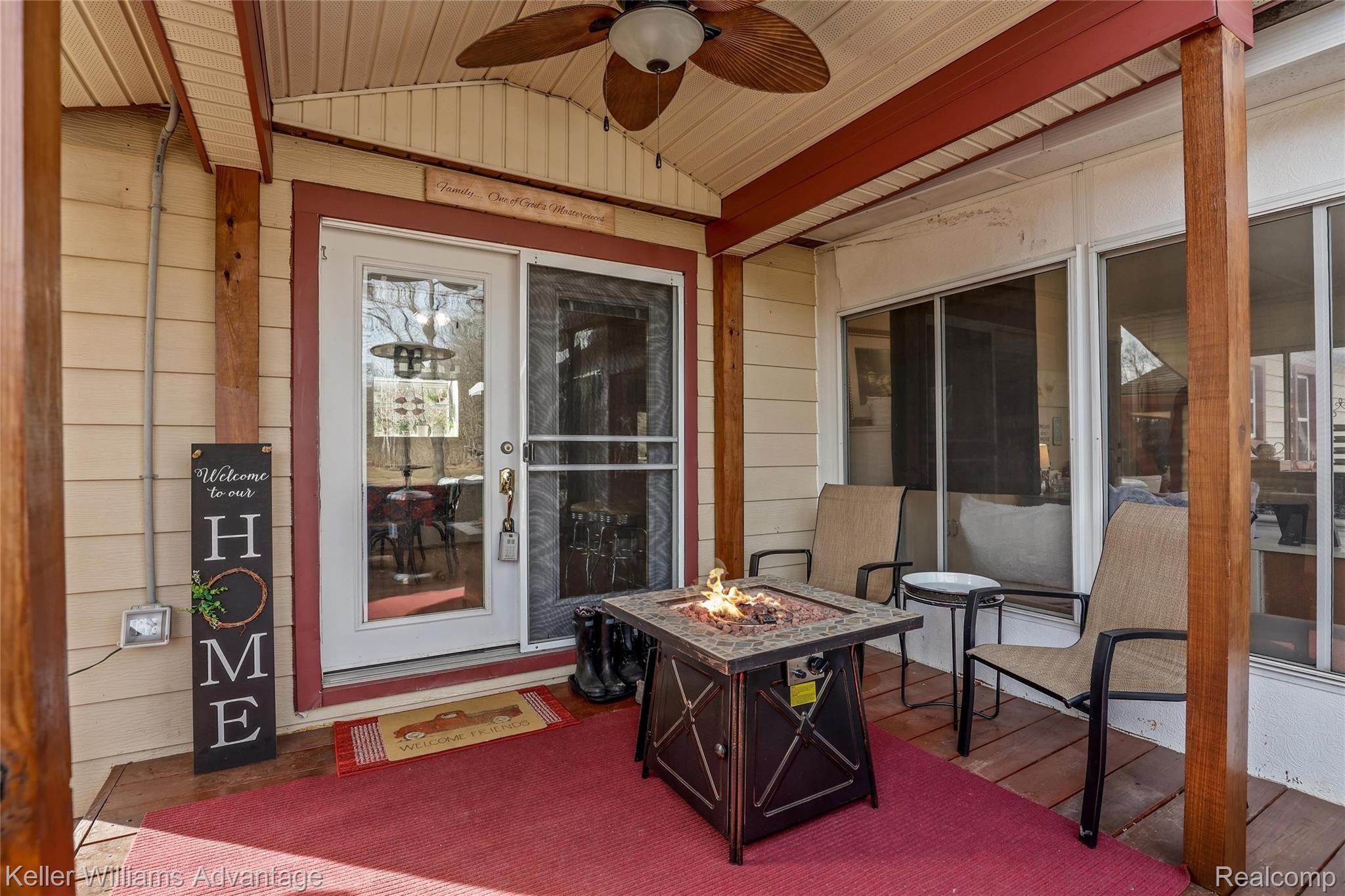 19731 Haggerty Road Belleville, MI 48111 - Photo 8 of 52 Space to relax under the covered porch if its raining