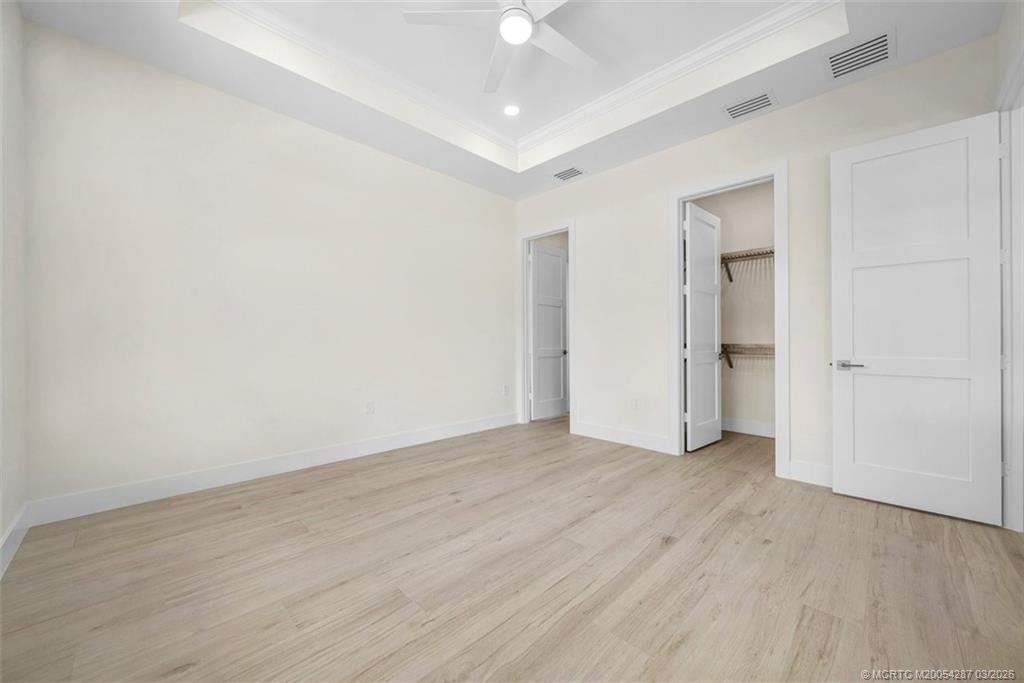 5101 Southeast Burning Tree Circle Stuart, FL 34997 - Photo 31 of 85 En-suite bedroom