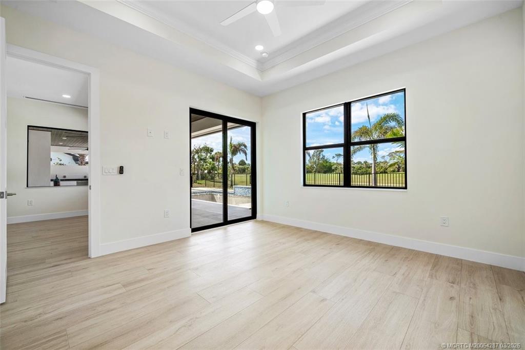 5101 Southeast Burning Tree Circle Stuart, FL 34997 - Photo 32 of 85 En-suite bedroom