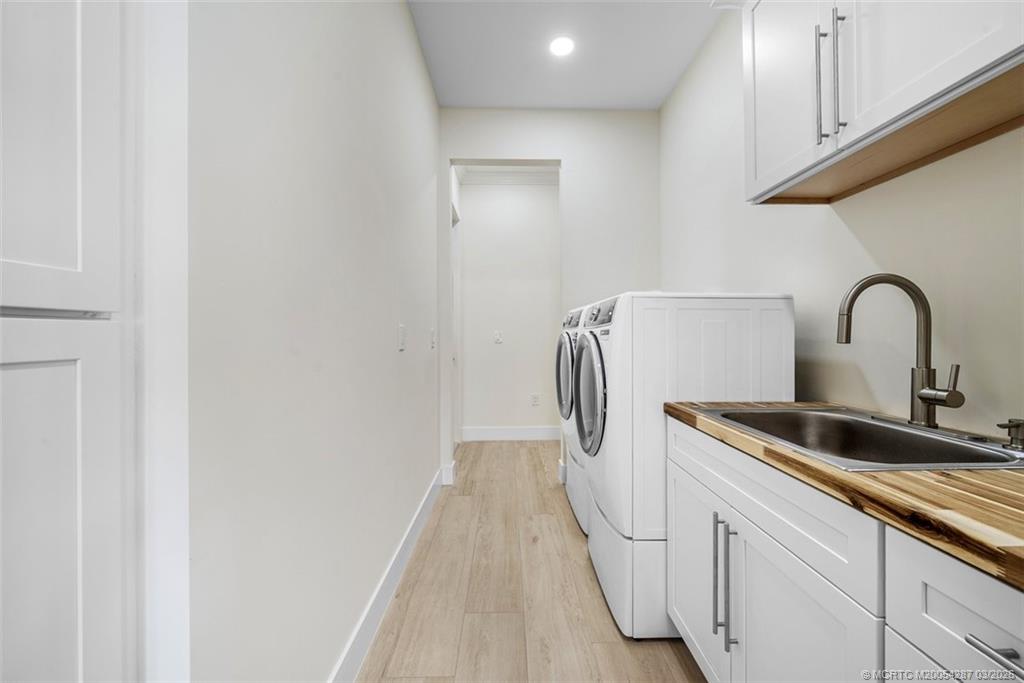 5101 Southeast Burning Tree Circle Stuart, FL 34997 - Photo 50 of 85 Laundry, storage, sink, changing area