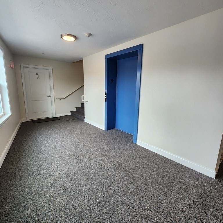 130 Spring Street, Unit 202 Mansfield, MA 02048 - Photo 14 of 23 a view of empty room