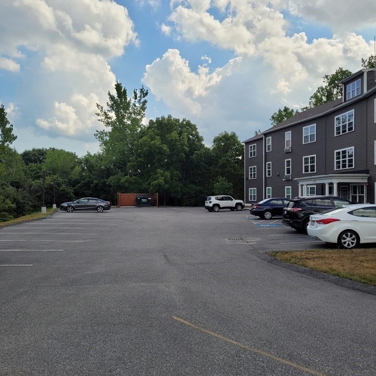 130 Spring Street, Unit 202 Mansfield, MA 02048 - Photo 23 of 23 a view of street with parked cars
