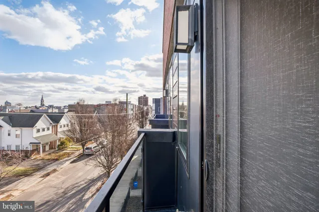 a view of a balcony with city view
