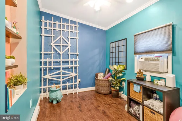 a view of a livingroom with furniture and toys