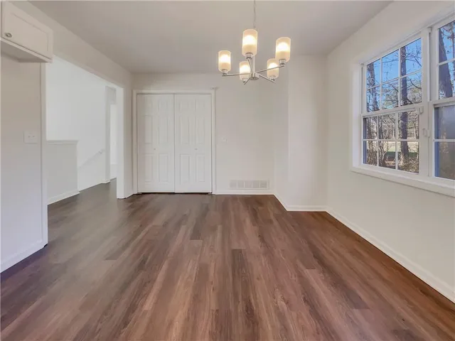 a view of livingroom with hardwood floor and window