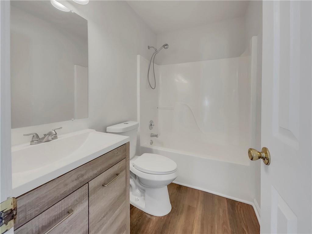 35 Grove Lane Temple, GA 30179 - Photo 17 of 25 a bathroom with a sink a toilet and shower