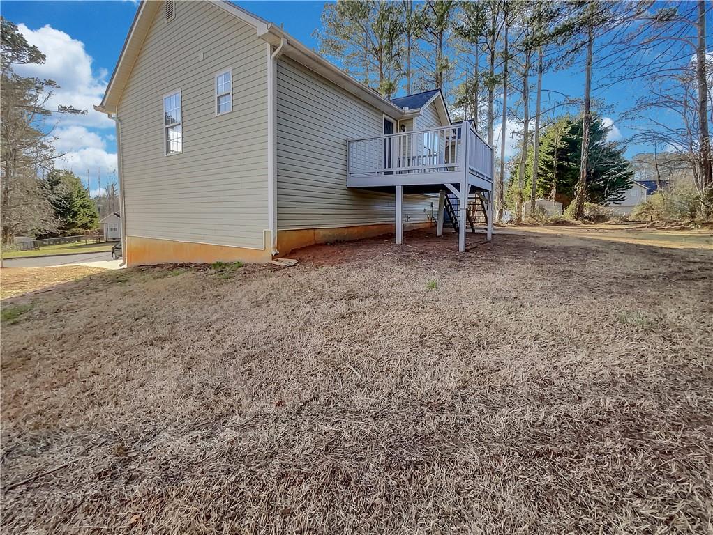 35 Grove Lane Temple, GA 30179 - Photo 23 of 25 a view of a house with a yard and sitting area