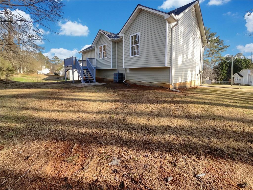 35 Grove Lane Temple, GA 30179 - Photo 24 of 25 a view of a house with a yard