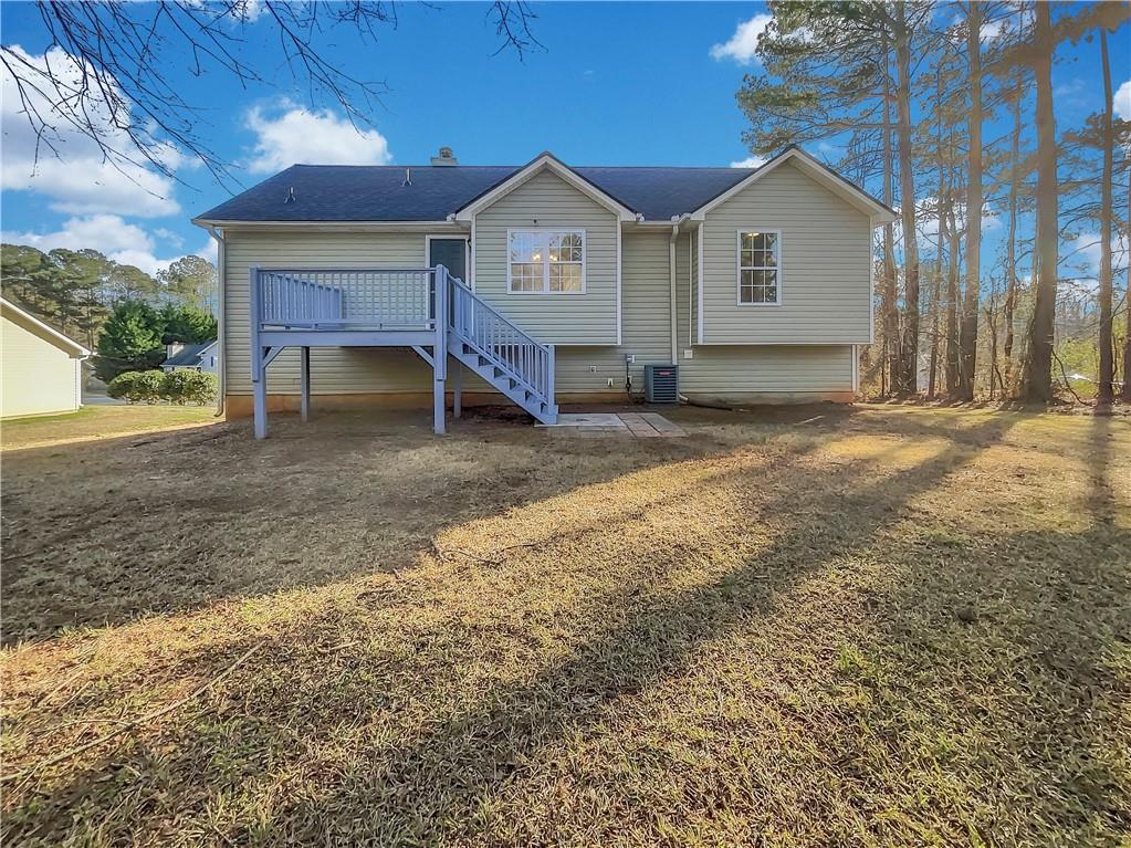 35 Grove Lane Temple, GA 30179 - Photo 25 of 25 a view of a house with a yard and large tree