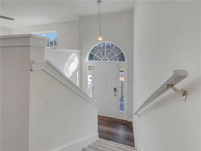 a view of entryway and hall with a hallway