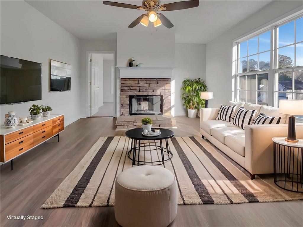 35 Grove Lane Temple, GA 30179 - Photo 5 of 25 a living room with furniture and a flat screen tv