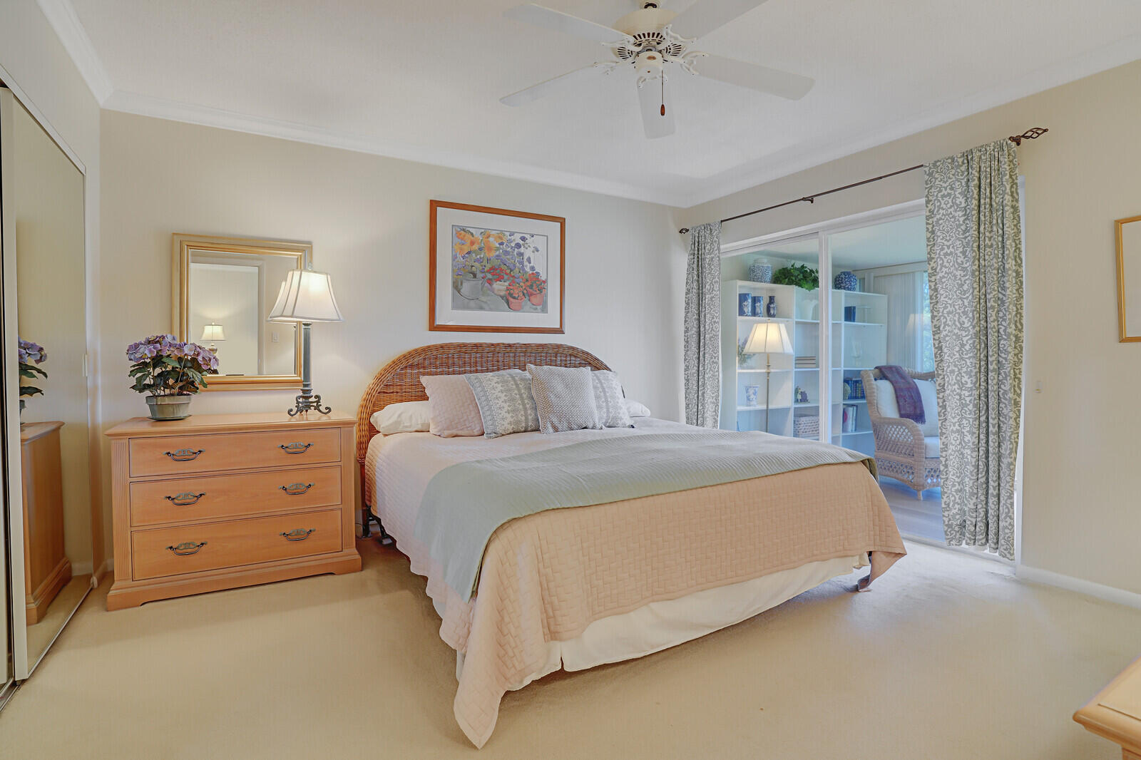 20 Celestial Way, Unit 314 Juno Beach, FL 33408 - Photo 15 of 35 a bedroom with a bed and a dresser