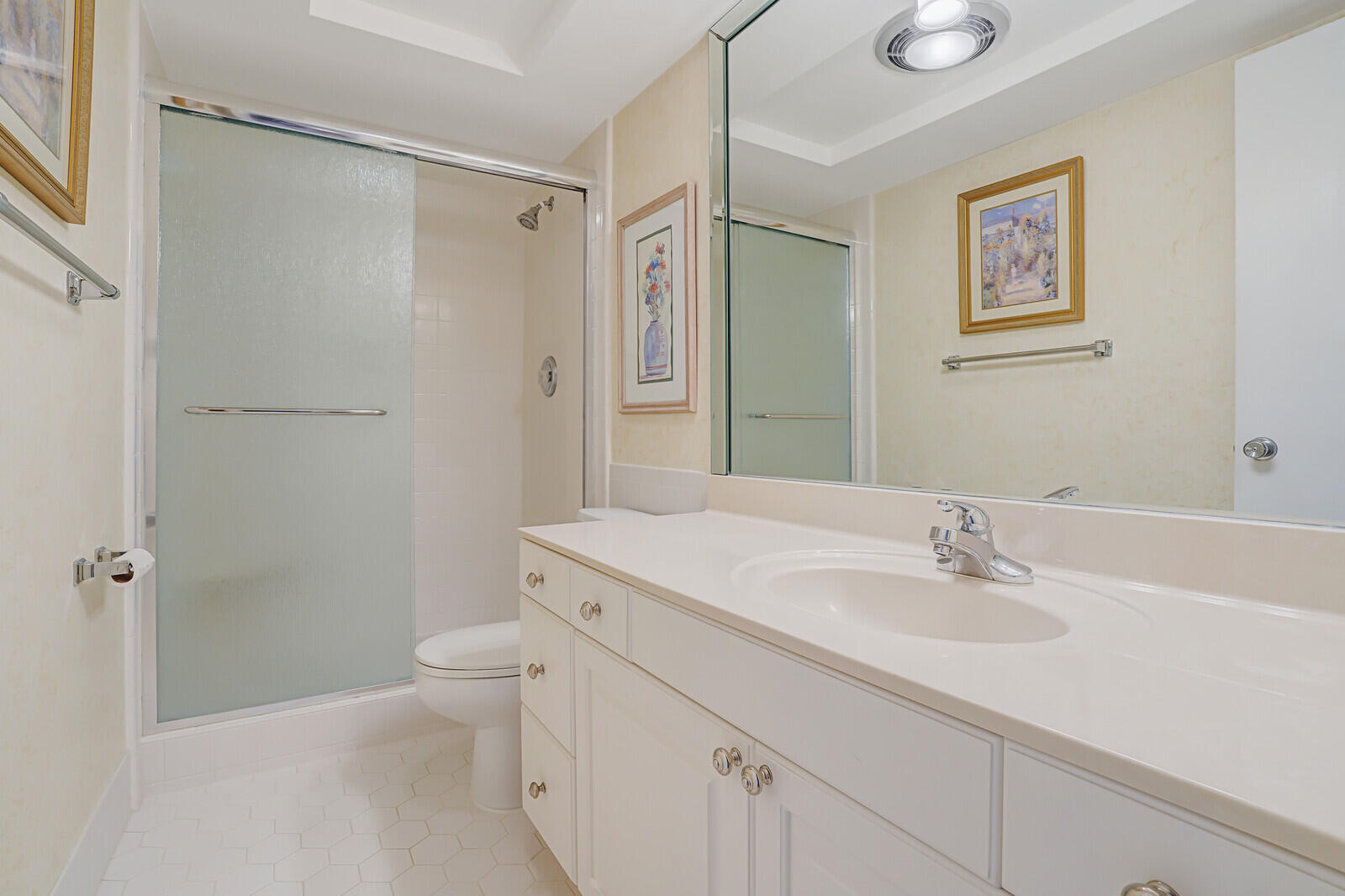 20 Celestial Way, Unit 314 Juno Beach, FL 33408 - Photo 21 of 35 a bathroom with a sink a toilet and shower