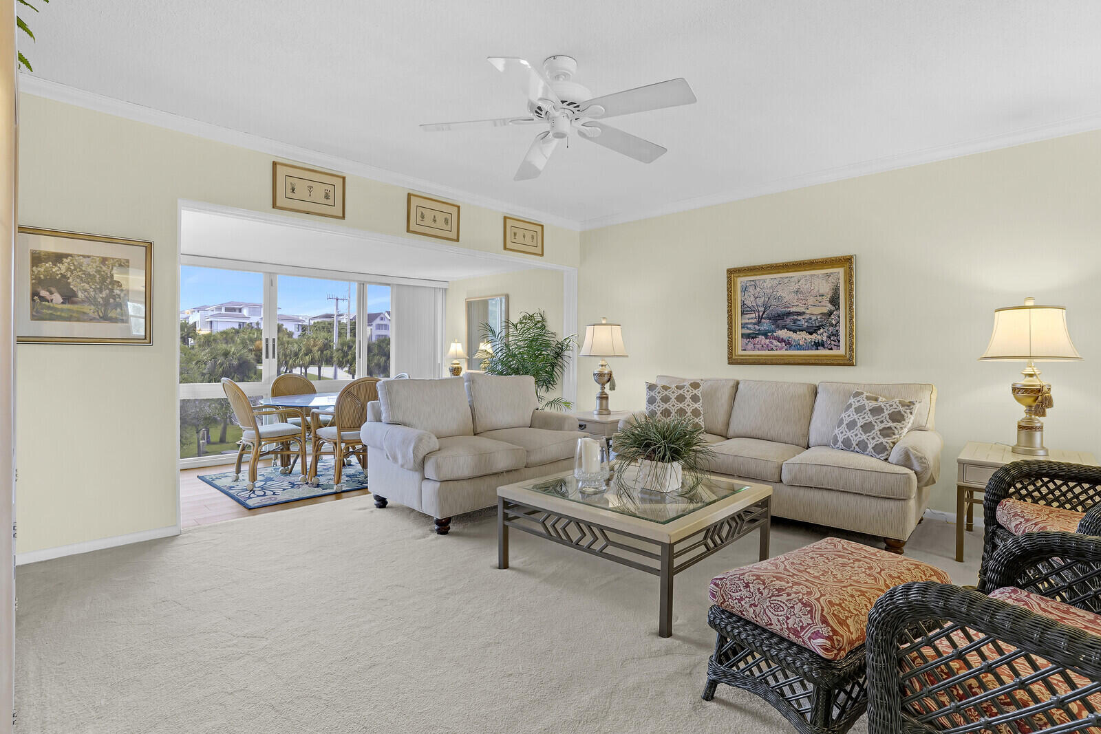 20 Celestial Way, Unit 314 Juno Beach, FL 33408 - Photo 8 of 35 a living room with furniture and a large window