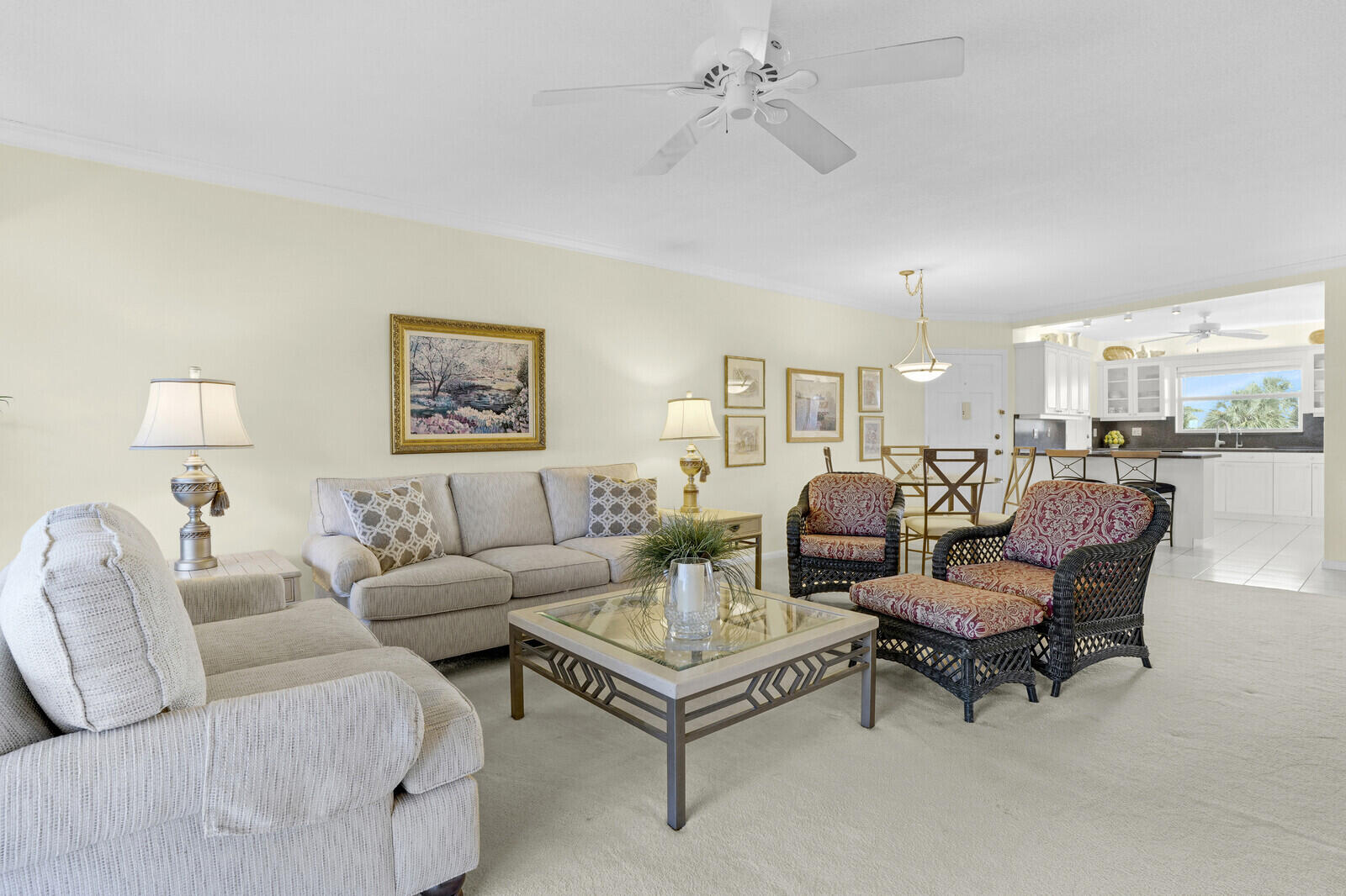 20 Celestial Way, Unit 314 Juno Beach, FL 33408 - Photo 9 of 35 a living room with furniture and a chandelier