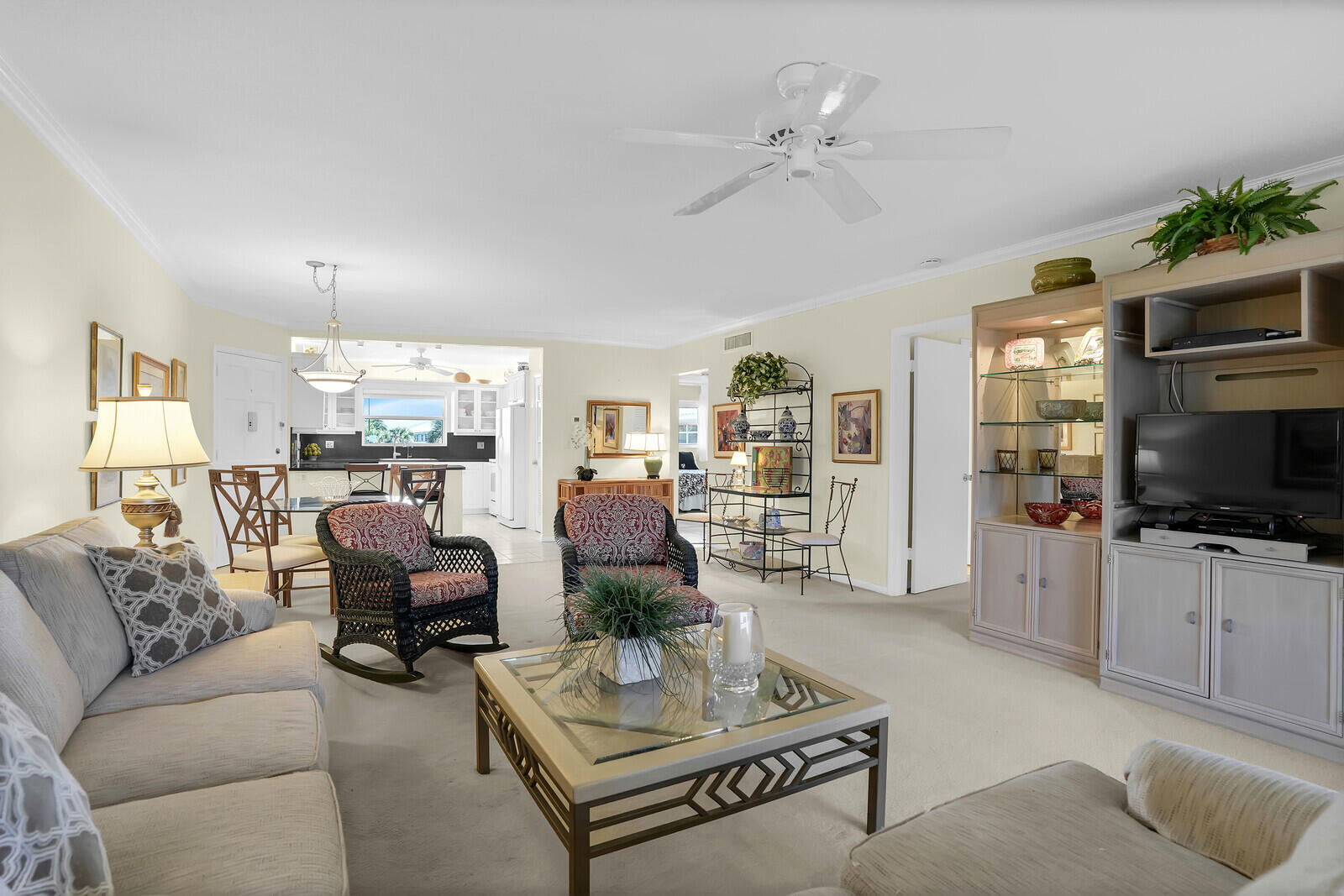20 Celestial Way, Unit 314 Juno Beach, FL 33408 - Photo 10 of 35 a living room with furniture and a flat screen tv