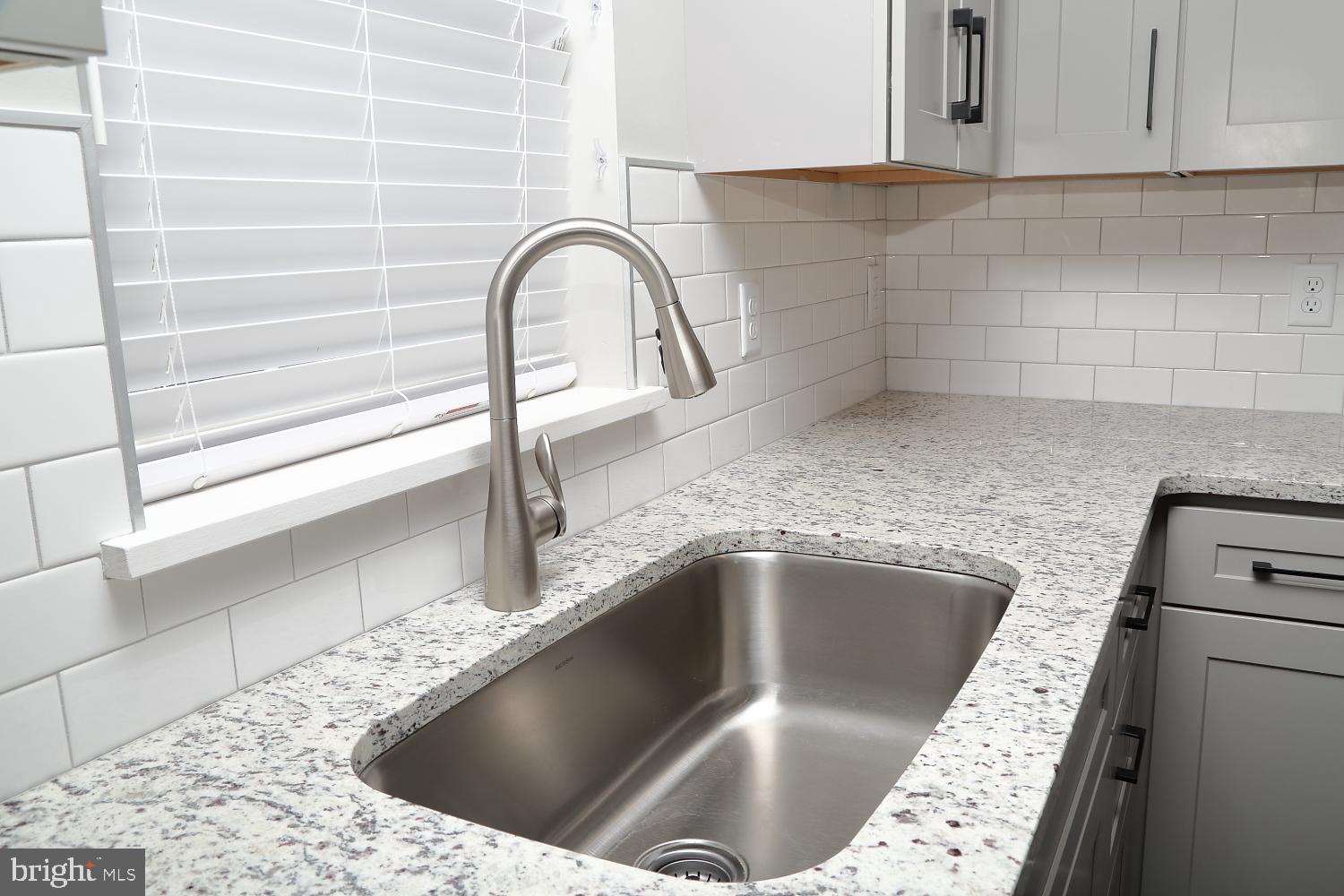 2 South Lime Street, Unit 6 Quarryville, PA 17566 - Photo 6 of 9 a kitchen with a sink and a bathtub